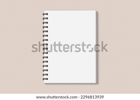 Realistic spiral notebook blank cover mockup flatlay. Simple blank note book mock up on clean background top view. White empty notepad cover to place your design, flat lay concept Royalty-Free Stock Photo #2296813939