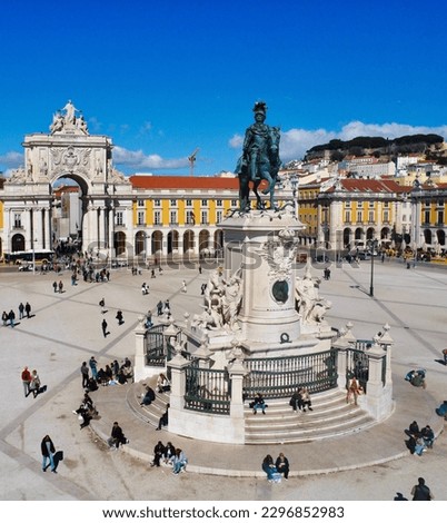 Praça do Comércio, Lisbon. This famous European landmark hosts millions of visitors a year. Aerial photo showing the square, o arco do triunfo, and King Jose statue.
