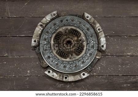 Disassembled clutch disc of a car in a car service repair shop