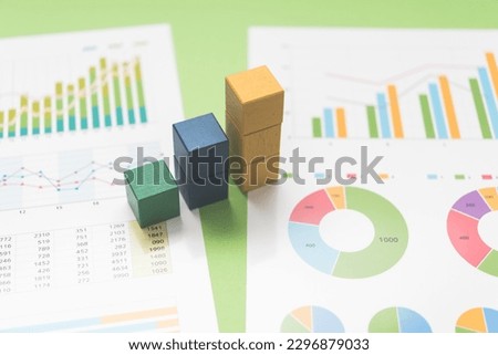 Information and data materials such as bar and pie charts used in business.