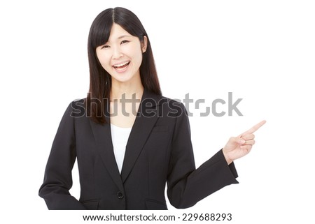 Japanese businesswoman pointing side