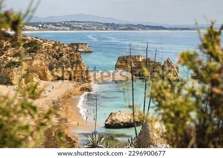 Portugal Algarve beach, Lagos Praia do Pinhão cliffcoast Royalty-Free Stock Photo #2296900677