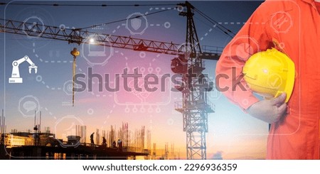 Double exposure Engineers construction and Silhouette construction workers with Crane construction and team working in site. construction safety concept background sunset