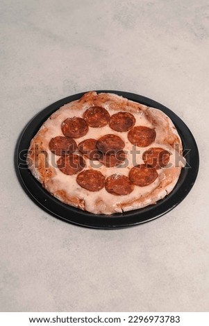 the homemade pepperoni pizza hot