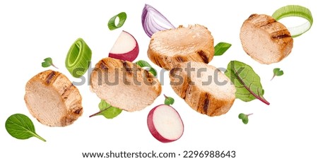 Grilled chicken slices with vegetables isolated on white background Royalty-Free Stock Photo #2296988643