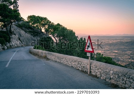 Curvy Road to Sanctuary of Sant Salvador at Sunset