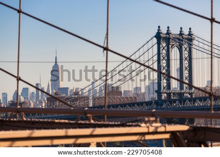Manhattan Bridge and New York Cityscape from Brooklyn Bridge