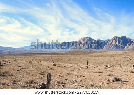 Desert and Mountains in sunlight Royalty-Free Stock Photo #2297058119
