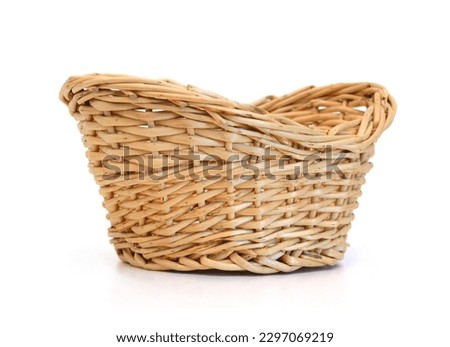 Empty wooden fruit or bread basket on white background  Royalty-Free Stock Photo #2297069219