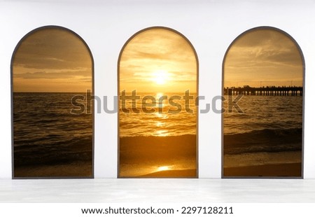 Modern style living room with 3 windows. The windows are decorated with wooden frames. Overlooking the sea and the beach during the sunset, clear with beautiful sunlight.