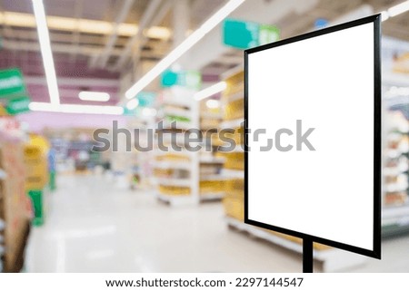 Blank price board with fresh food in supermarket abstract blurred background