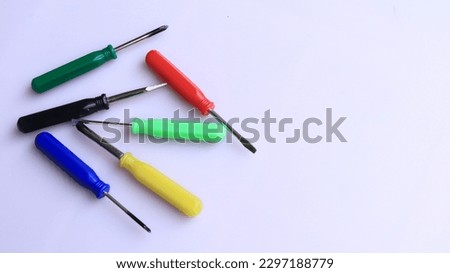 Closeup image of multicolored screwdrivers. Isolated on white background, copy space objects.