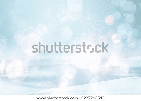 SOFT BLUE LIGHT WINTER SNOW BACKGROUND WITH SPARKLING BOKEH LIGHTS, COLD NATURAL CHRISTMAS STILL LIFE WITH SNOWY PLACE FOR MONTAGE CHRISTMAS PRESENTS AND GIFTS