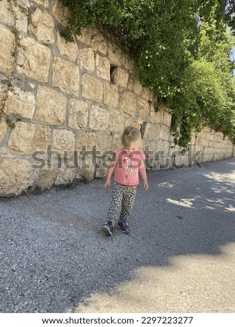 happy toddler in the street of Jerusalem