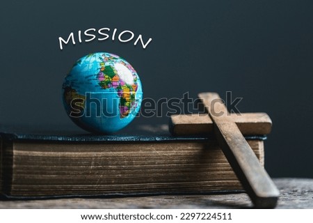Globe with Holy Bible for mission, Mission christian idea. bible and book on wooden table, Christian background for great commission