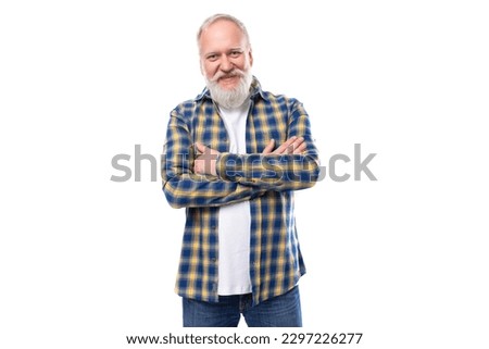 handsome senior pensioner gray-haired man with a beard in a shirt on a white background Royalty-Free Stock Photo #2297226277