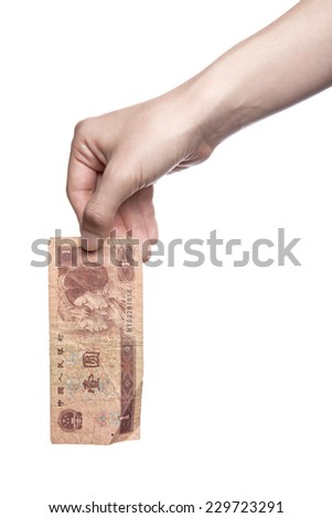 A female(woman) hand hold a money(chinese one yuan) isolated white at the studio.
