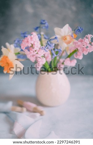 bouquet of spring flowers in a vase pastel colors