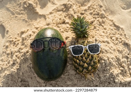 Fruit man made of pineapple and watermelon on the beach fruit tourism for health Funny and cute sunbathing fruits. Festive food. Summer travel concept. white background design invitation to visit