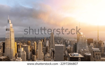 Manhattan skyline in New York, showcasing the impressive architecture and modern cityscape at sunset