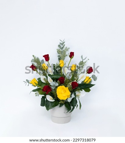 Fen arrangment with fresh flowers