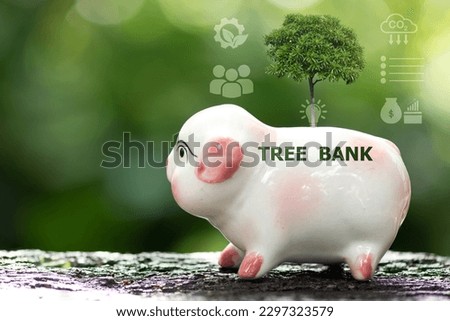 Piggy bank, tree and icons on nature background. Planting trees to reduce carbon dioxide by saving data and trading it is called carbon credit.