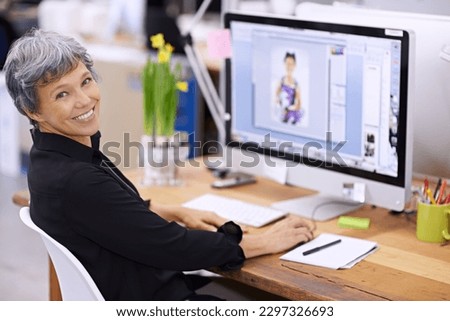Senior woman at desk, computer screen and smile in portrait, editor at magazine and editing image with software for publication. Professional female with creativity and editorial career with design Royalty-Free Stock Photo #2297326693