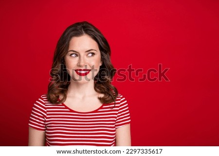 Photo of gorgeous girl party visage makeover red lips wavy hairdo look side empty space isolated red maroon color background