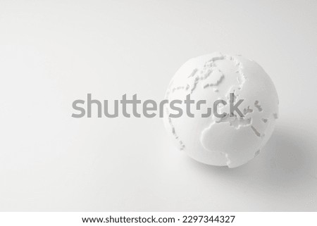 white globe on white background Royalty-Free Stock Photo #2297344327