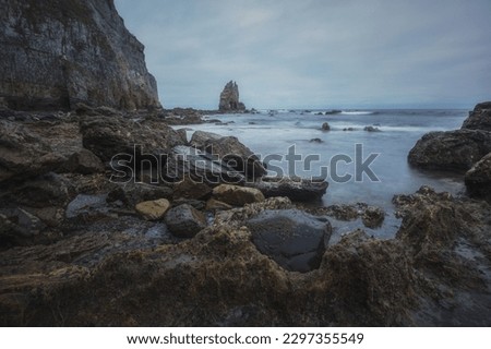 rocks and waves in campiecho beach.Asturies. Spain