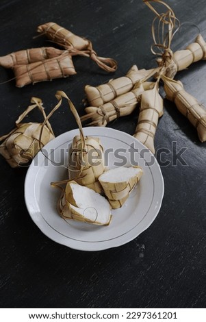the tradition of cooking ketupat one week after Eid al-Fitr