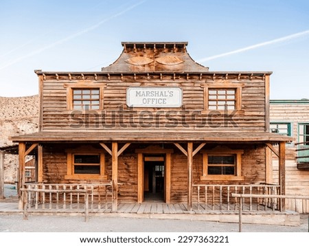 Great view of houses in western style set for movies, mini hollywood in the middle of desert, in Tabernas, Almeria, Andalucia, Spain Royalty-Free Stock Photo #2297363221