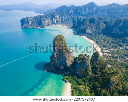 Railay Beach Krabi Thailand, the tropical beach of Railay Krabi, Panoramic view from a drone of idyllic Railay Beach in Thailand in the morning with a cloudy sky Royalty-Free Stock Photo #2297372437