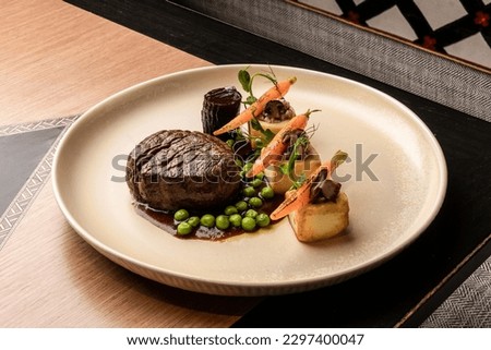 food plate table lunch dinner dish meal meat gourmet  Royalty-Free Stock Photo #2297400047