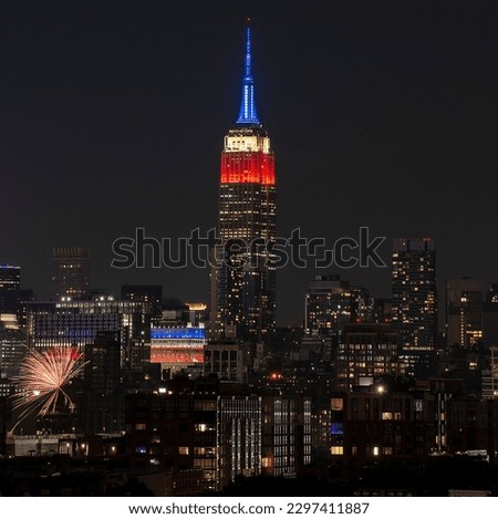 The illuminated Empire State Building in the New York City on 4th of July independence day