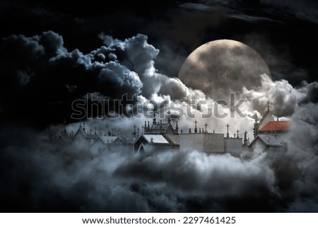 Conceptual image about death with cemetery in a cloudy sky in a full moon night Royalty-Free Stock Photo #2297461425
