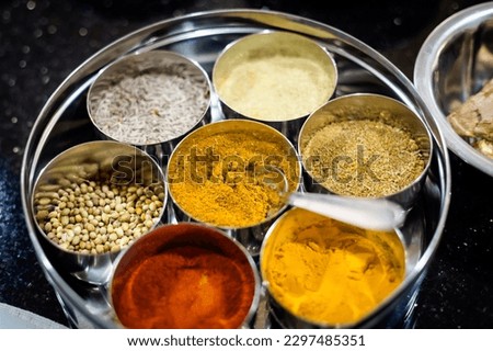 Traditional way of preparing indian food - fresh herbs and spices. Picture of traditional India cooking class in Goa