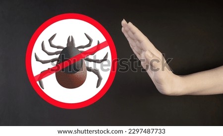 Tick parasite icon. Hand shows stop warning sign about parasites. Human tick epidemic, warning sign illustration.