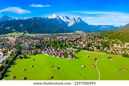 Garmisch-partenkirchen and Zugspitze mountain aerial panoramic view. Garmisch Partenkirchen is an Alpine ski town in Bavaria, southern Germany. Royalty-Free Stock Photo #2297500495