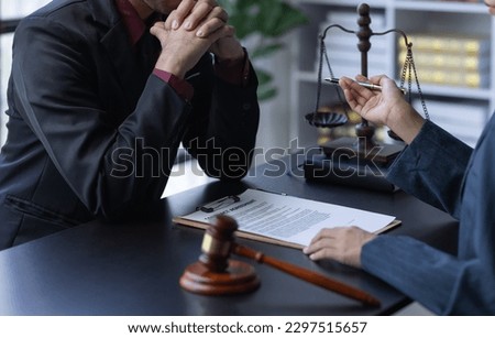 The boss is pointing in the face at the helper who misbehaved in business or legal matters in law firm office. Legal law, advice deal justice and law concept. Royalty-Free Stock Photo #2297515657