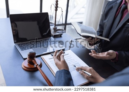 Consultation of Businesswoman Private office of a young Asian lawyer working on financial information in a private bank. to verify financial accounts and assist clients.