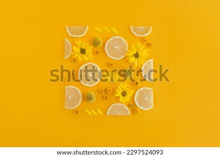 Flowers, fruits, citrus in a frame.  Party invitations, healthy food and lifestyle.  Bright background, yellow summer pattern, light spring colors.  Solar isolated screensaver for phone, computer.