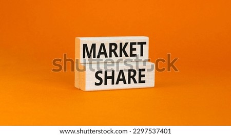Market share symbol. Concept words Market share on beautiful wooden block. Beautiful orange table orange background. Business and Market share concept. Copy space.