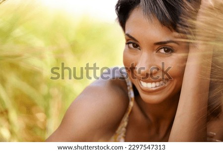 Happiness depends on our approach to life. Portrait of a beautiful woman spending time in the beautiful outdoors. Royalty-Free Stock Photo #2297547313