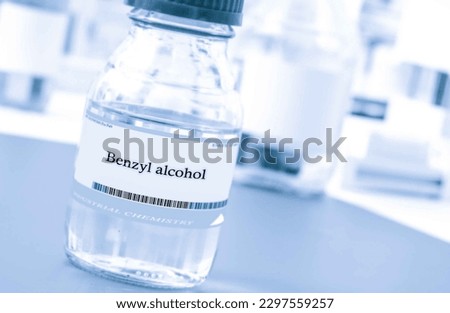 Benzyl alcohol A colorless, viscous liquid used as a solvent and in the production of various chemicals, such as fragrances and flavors. Royalty-Free Stock Photo #2297559257