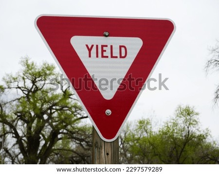 Yield sign in rural area obey traffic laws