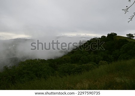 beautiful mountain top view on a stormy spring day
