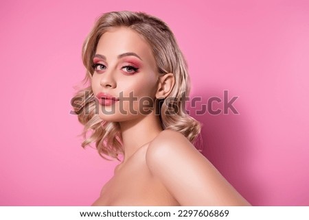 Portrait of attractive model girl studio portrait flawless body skin look camera posing isolated pink pastel background Royalty-Free Stock Photo #2297606869