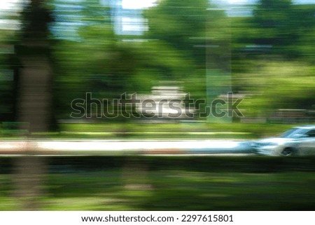 Motion Blurred Background of a Passing Car