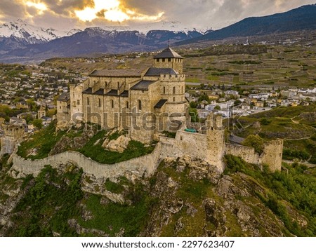 Beautiful views of the Basilique, Chateau and the Alps mountains at Sion, Switzerland